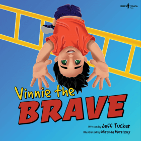 Smiling black-haired boy hanging upside down from monkey bars above text Vinnie the Brave